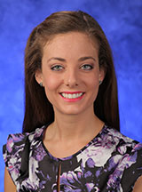 A head-and-shoulders professional photo of Gretchen Hackett