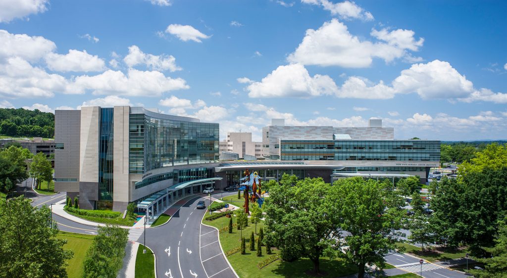 Penn State Health Milton S. Hershey Medical Center and Penn State College of Medicine campus is seen in an aerial photo on a sunny day.