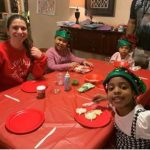Resident volunteer Kritstin Sanchez, PGY-3, from Project Fellowship participated in a holiday event on Sunday, December 11, 2022 with girls from Student Home Moldavia.